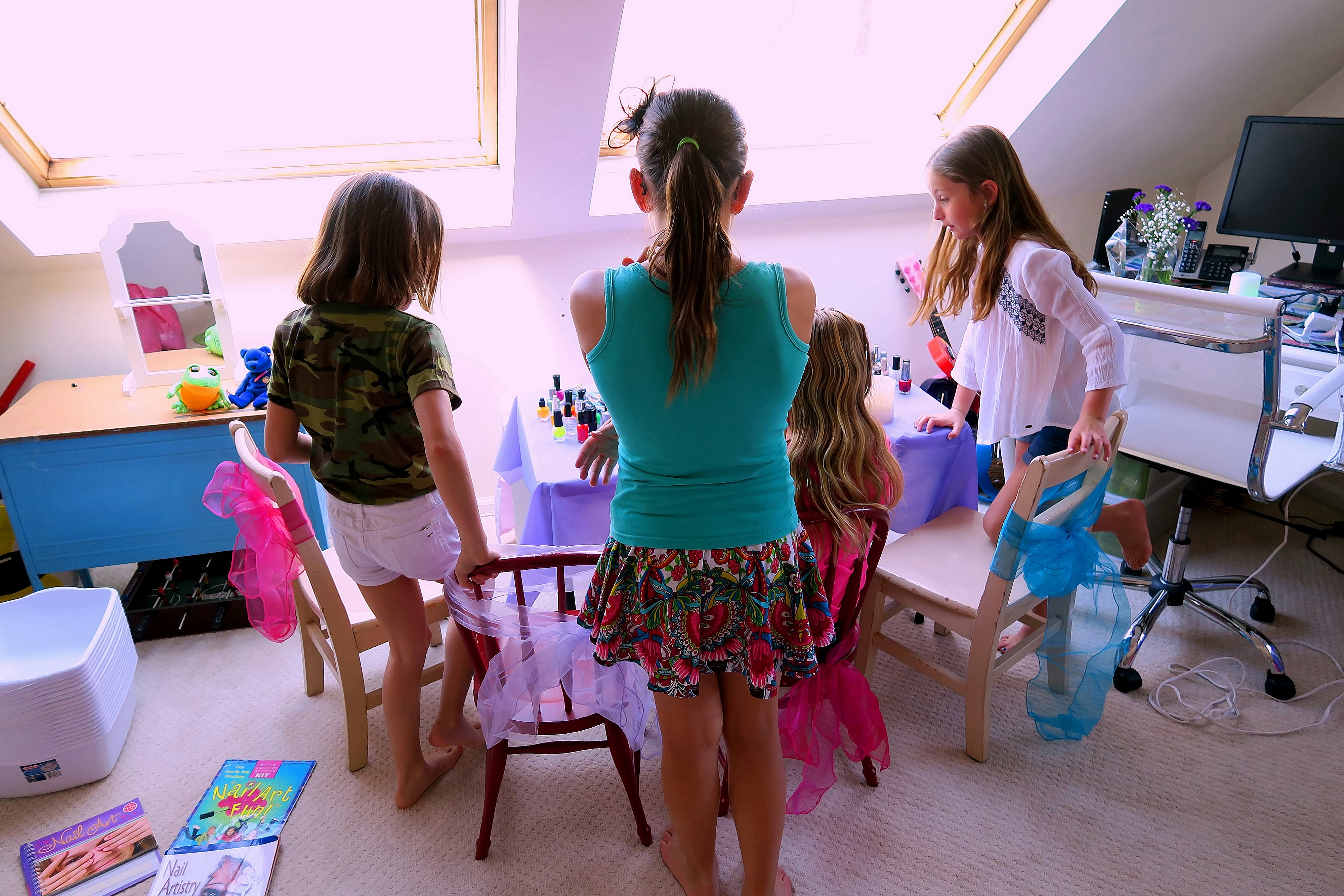 The Girls Checking Out The Nail Polish Selection Before The Party Begins. The Girls Checking Out The Nail Polish Selection Before The Party Begins.