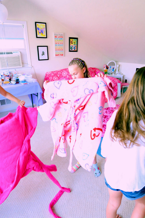 The Birthday Girl Selects A Robe. The Birthday Girl Selects A Robe.