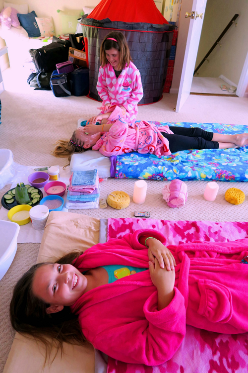 The Girls Both Relaxing During Their Facials At The Kids Spa Party. The Girls Both Relaxing During Their Facials At The Kids Spa Party.