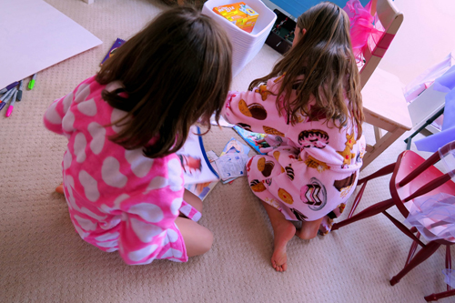 The Girls Perusing The Nail Art Design Books. The Girls Perusing The Nail Art Design Books.