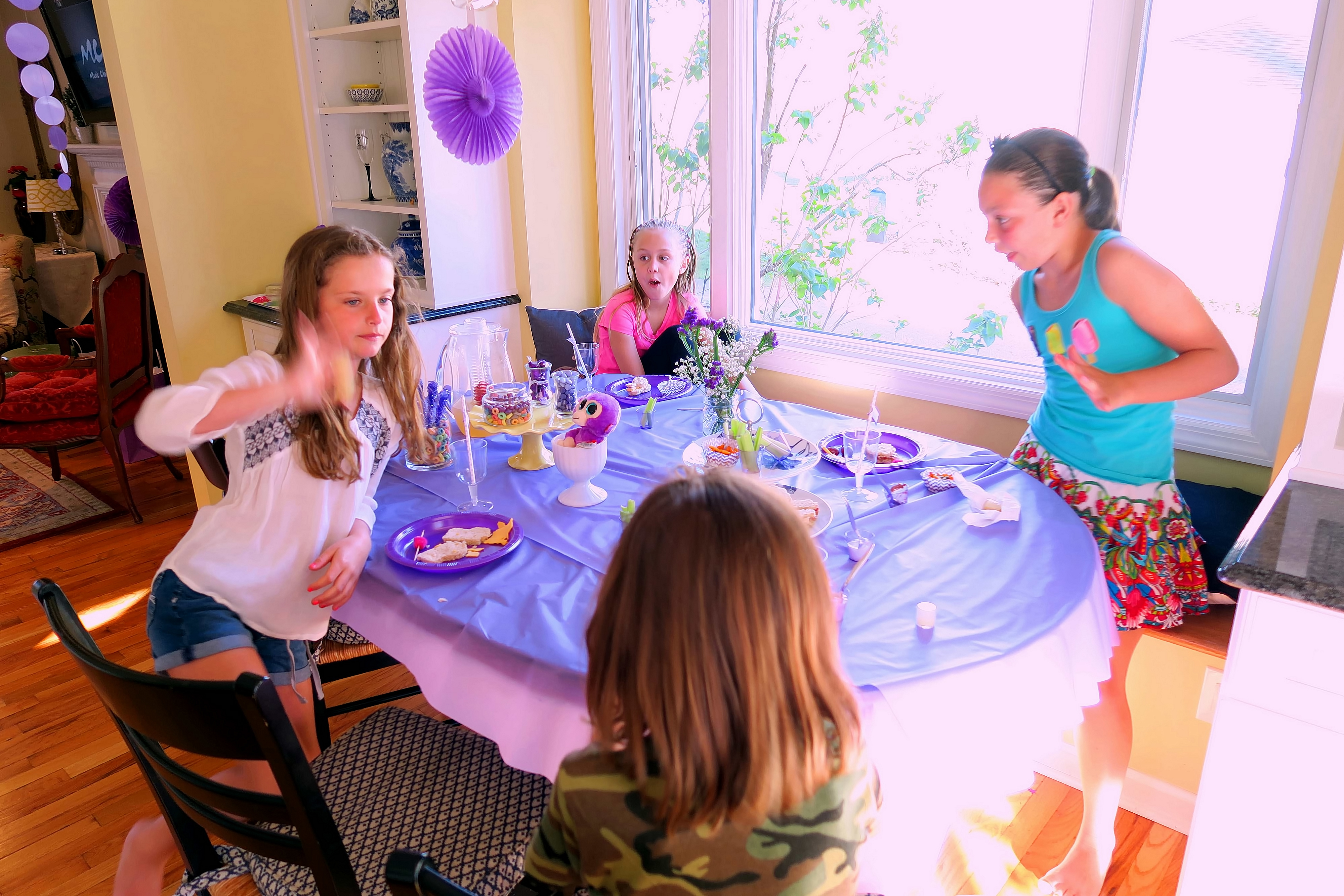 The Girls Sitting At The Table. The Girls Sitting At The Table.