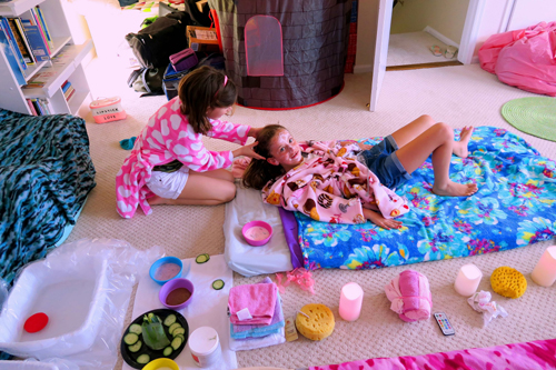 Giving Her Friend A Scalp Massage While Her Masque Is On Giving Her Friend A Scalp Massage While Her Masque Is On