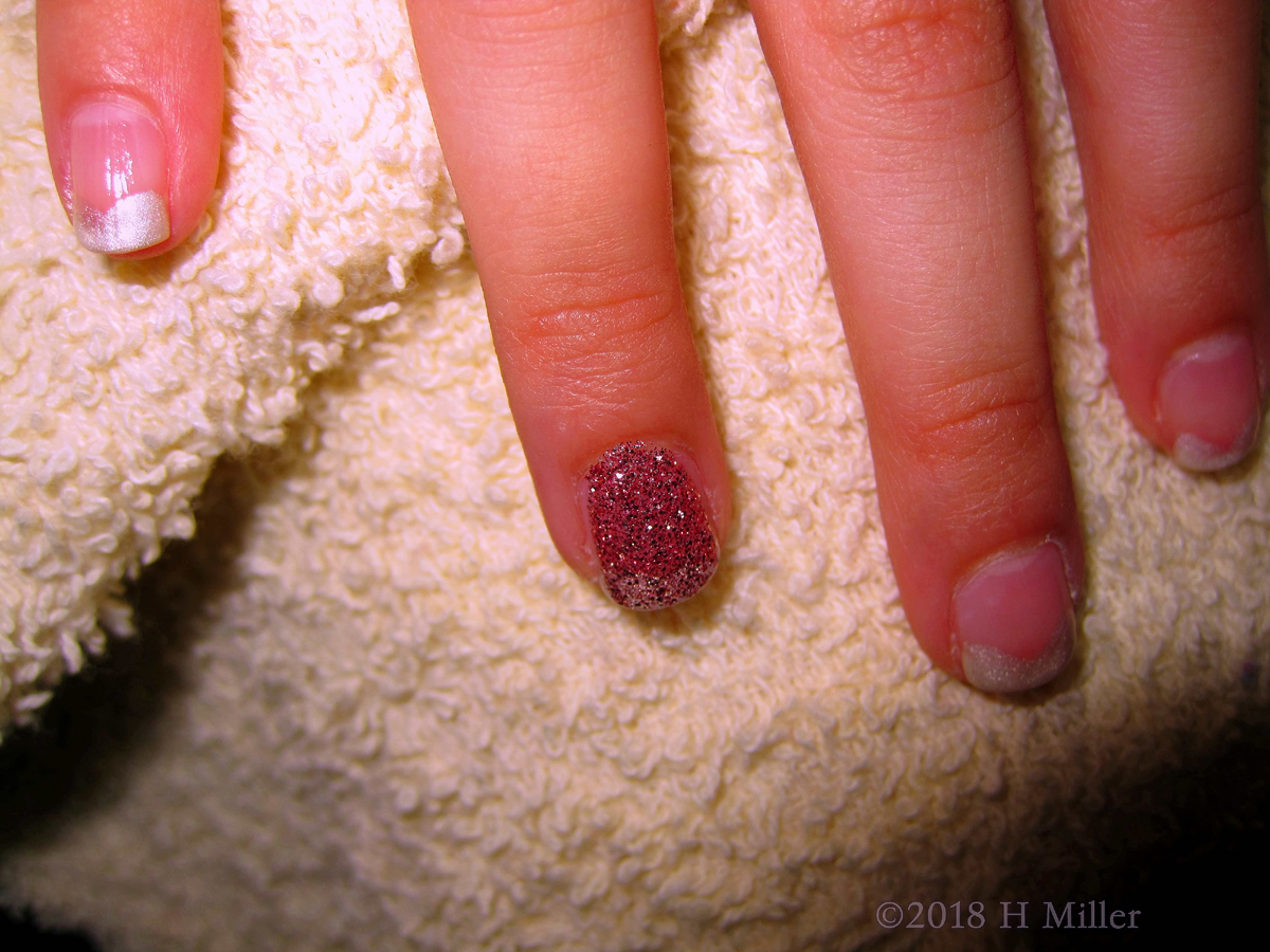 Close Up Of The Girls French Manicure With Glittery Accent Nail!