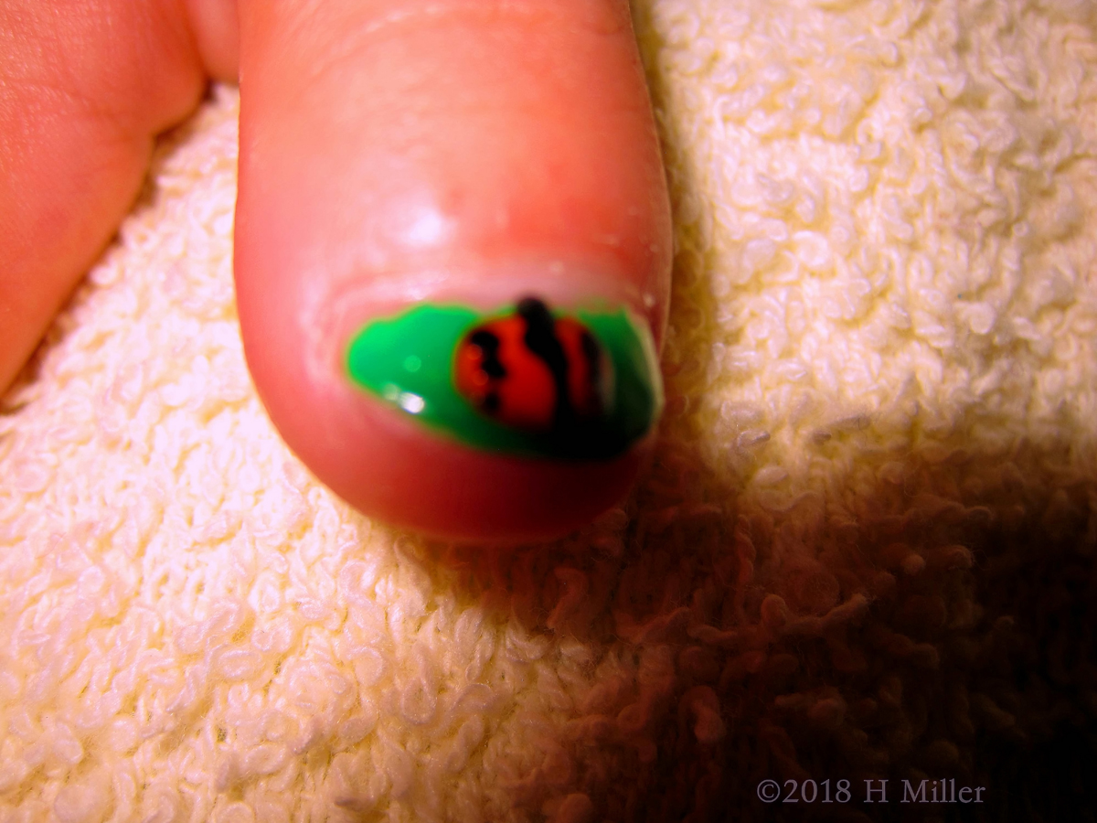 Green With An Orange Basketball Nail Design, A Great Combo! 