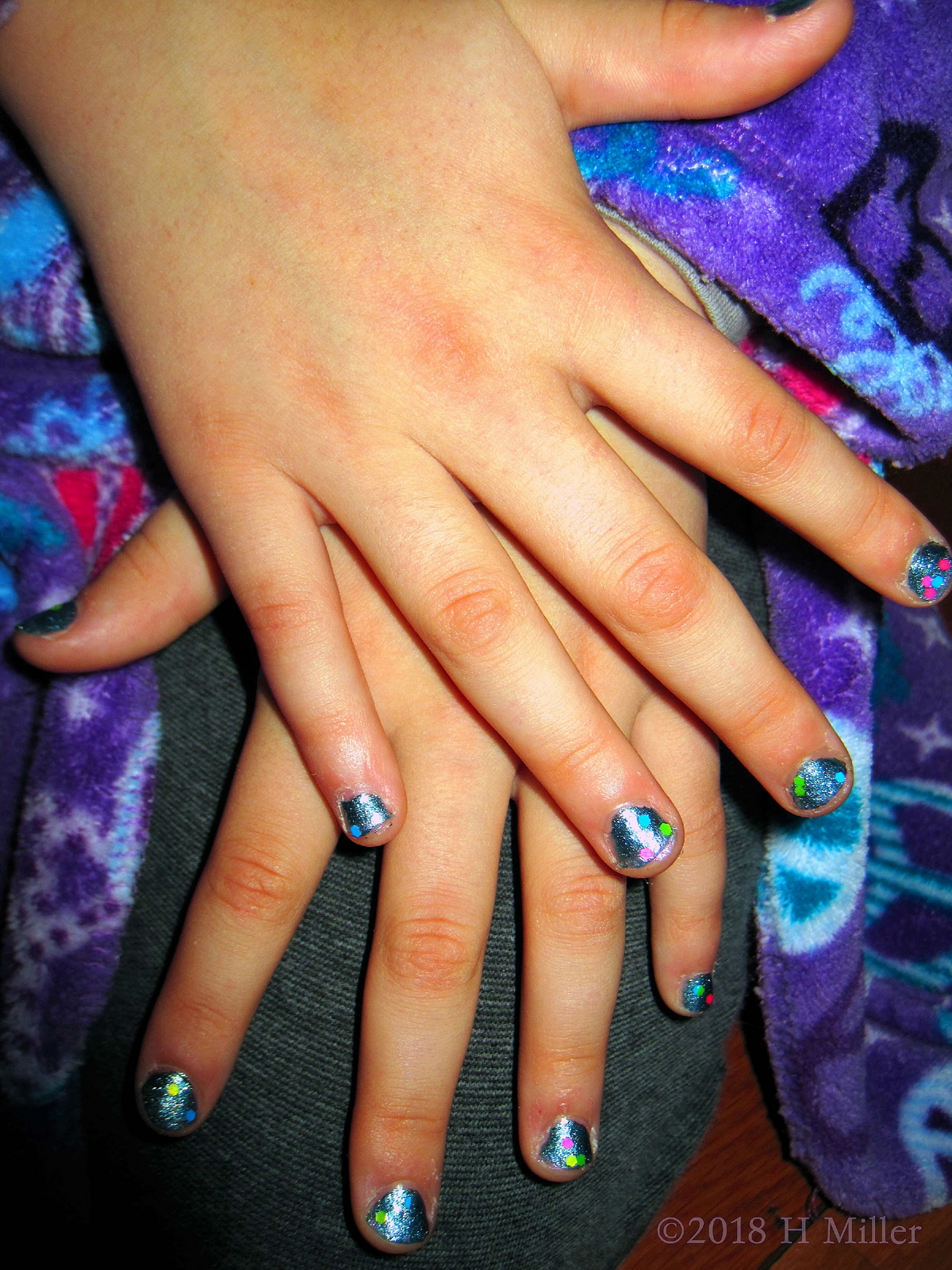 Shimmer Blue Girls Manicure With Colorful Polkadot Overlay 