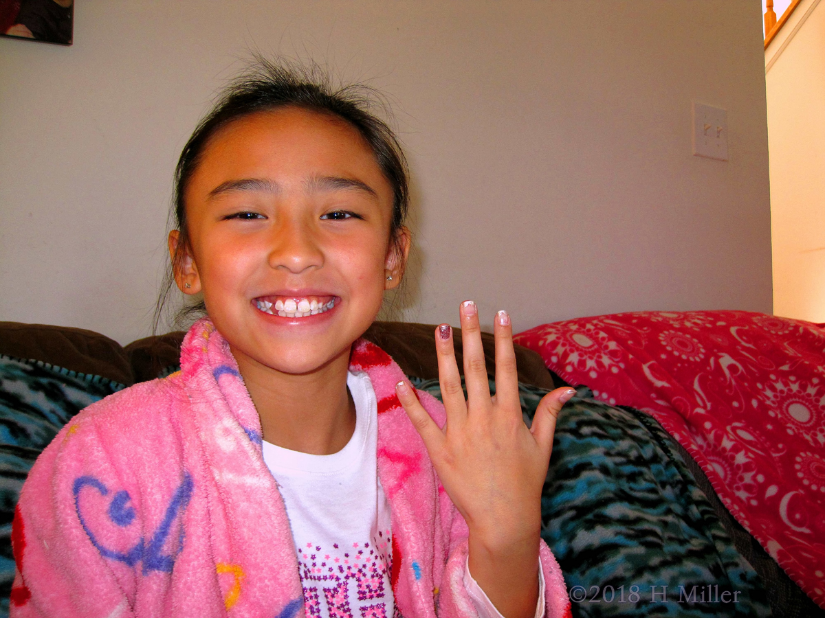 The Birthday Girl Showing Off Her Nail Design