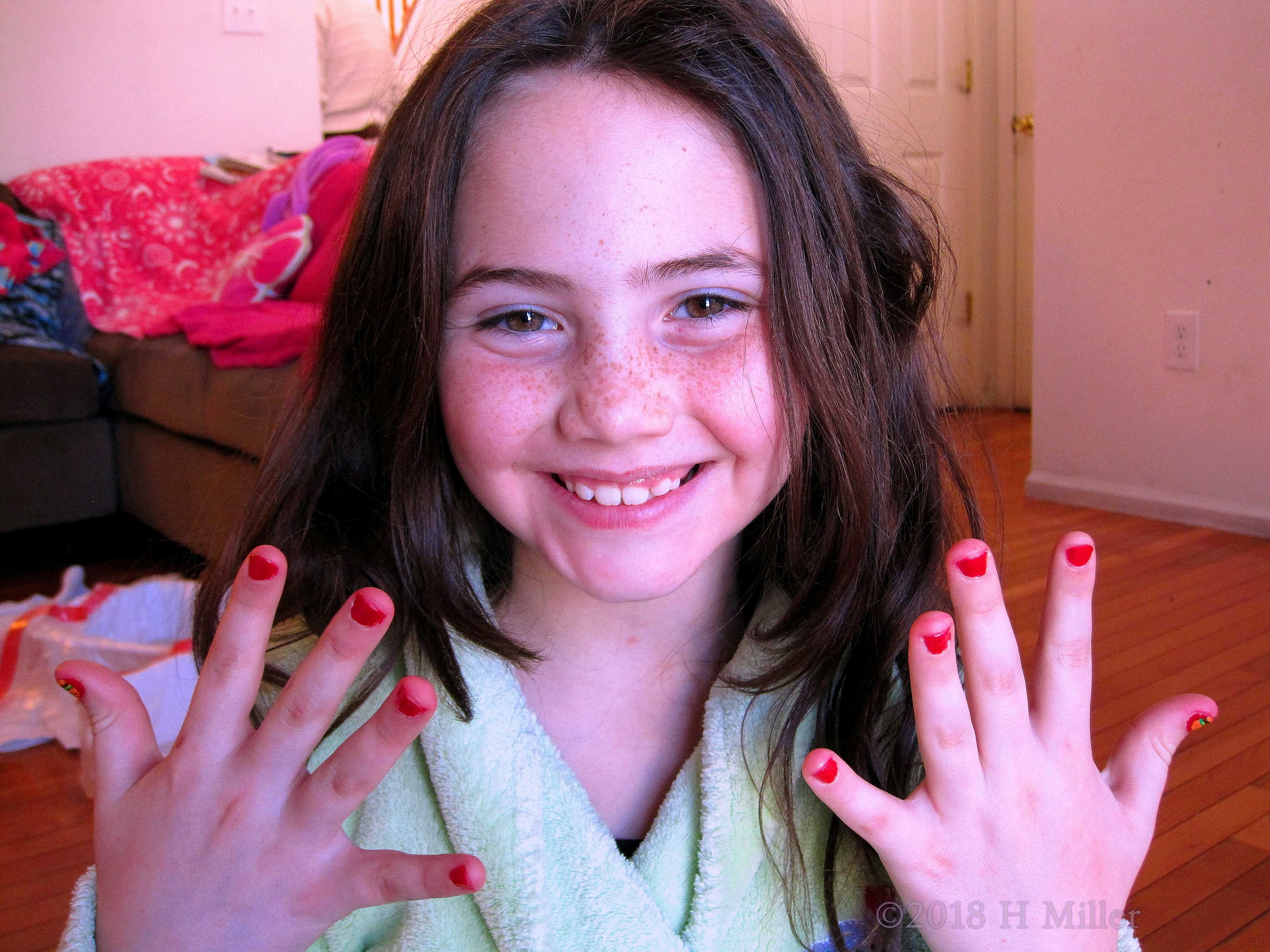 Party Guest Showing Off Her Mini Manicure. Party Guest Showing Off Her Mini Manicure.