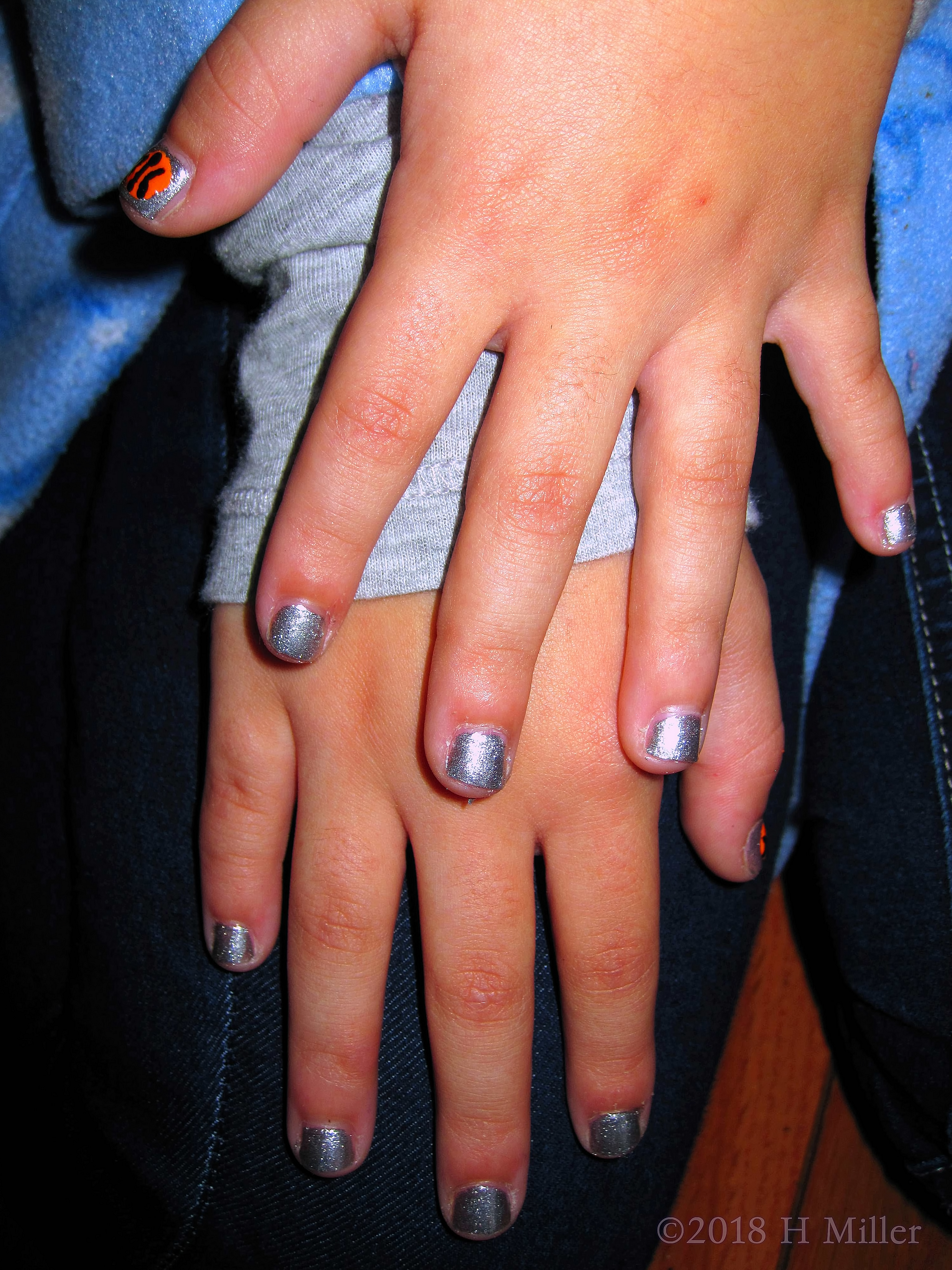 Silver Shimmer Girls Mini Mani With Basketball Nail Art. Silver Shimmer Girls Mini Mani With Basketball Nail Art.