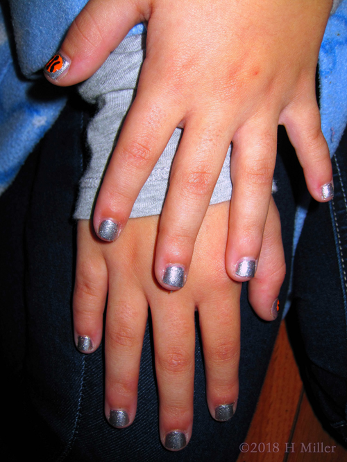 Silver Shimmer Girls Mini Mani With Basketball Nail Art. Silver Shimmer Girls Mini Mani With Basketball Nail Art.