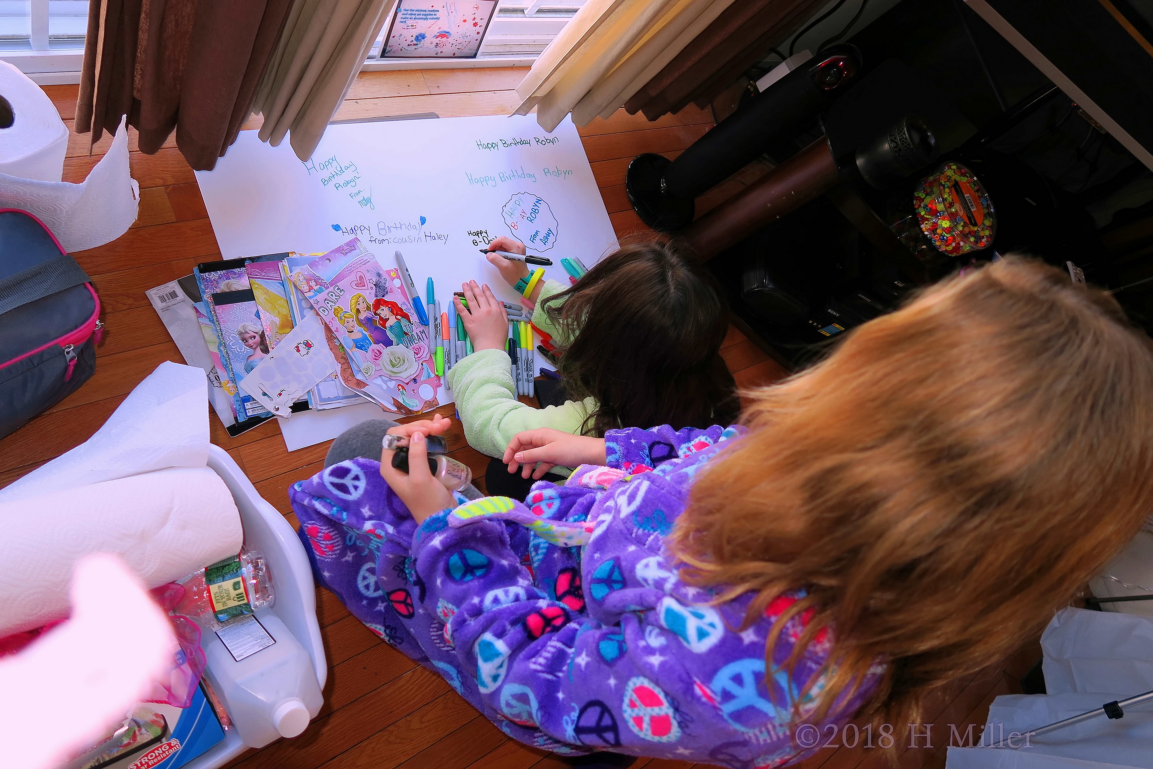 Party Guests Designing Robyn's Spa Birthday Card With Stickers, Markers, And Lots Of Love! 
