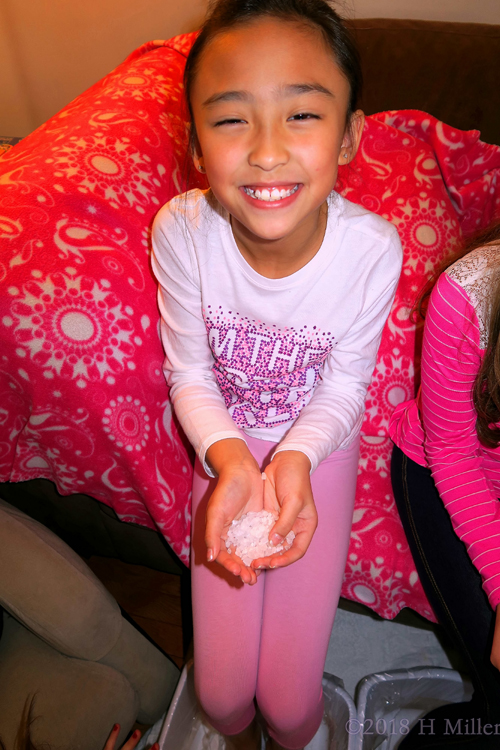 Birthday Girl All Smiles With Her Footbath Salt Crystals During Kids Pedicures!