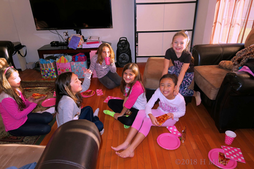 Birthday Girl And Party Guests Enjoy Pizza Birthday Girl And Party Guests Enjoy Pizza