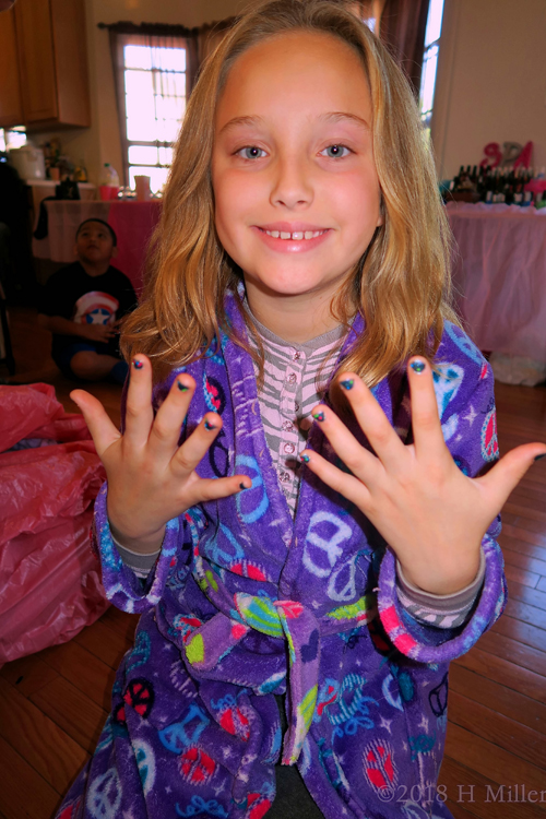 Party Guest In Purple Spa Robe Showing Off Her Mini Mani