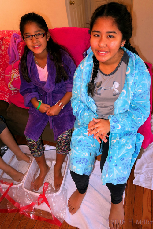 Party Guests In Their Comfy Robes Enjoy A Relaxing Mini Pedi Party Guests In Their Comfy Robes Enjoy A Relaxing Mini Pedi