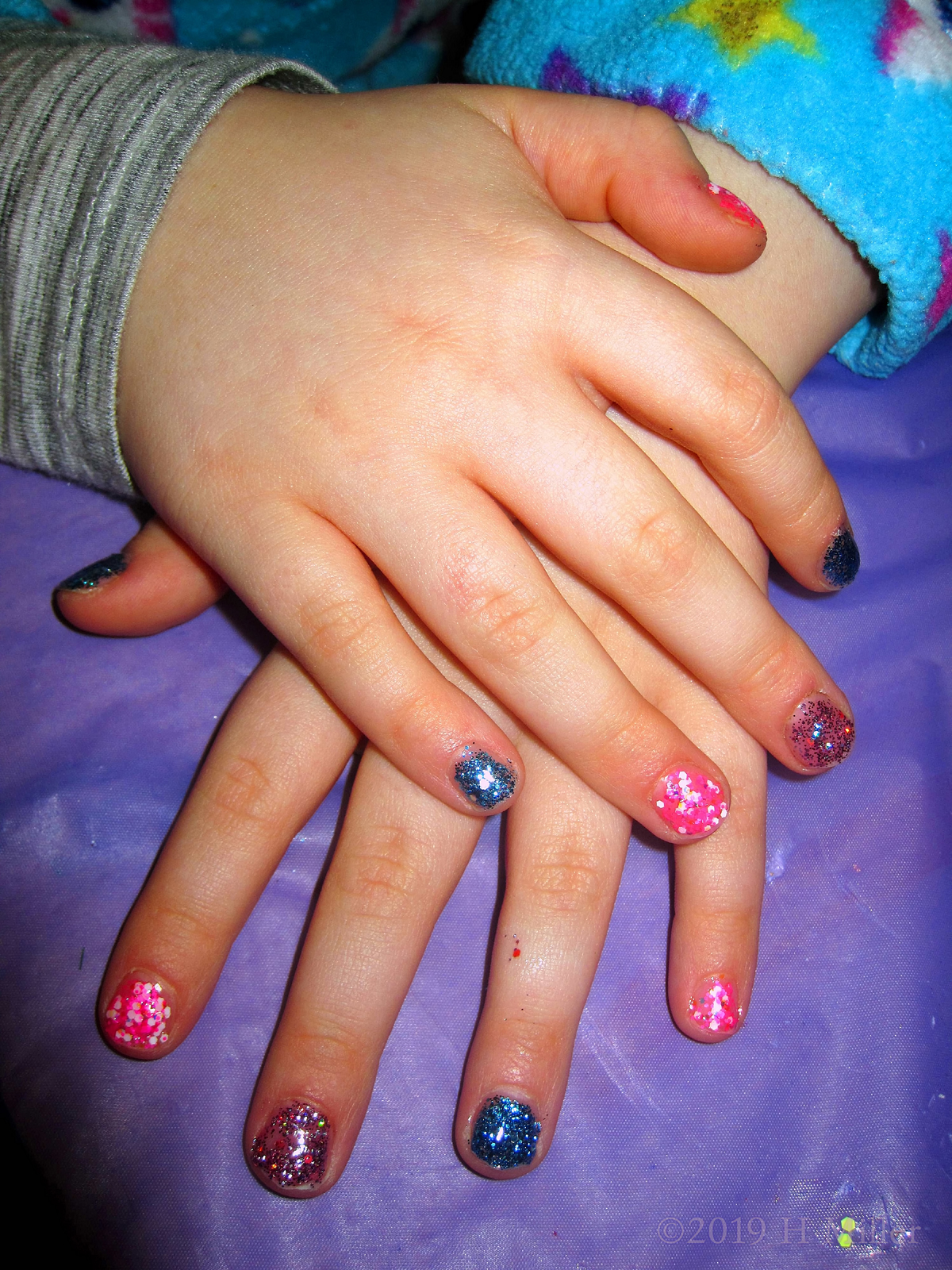 Blue and Pink Undercoats With Sparkly Overlay On This Manicure For Girls! 