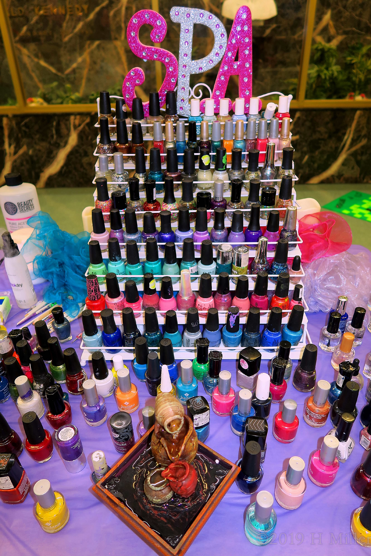 Nail Art Station Displaying A Wide Aray Of Polishes 