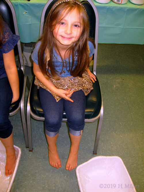 Party Goer Enjoying Her Manicure For Kids And Mini Pedi At The Spa Party