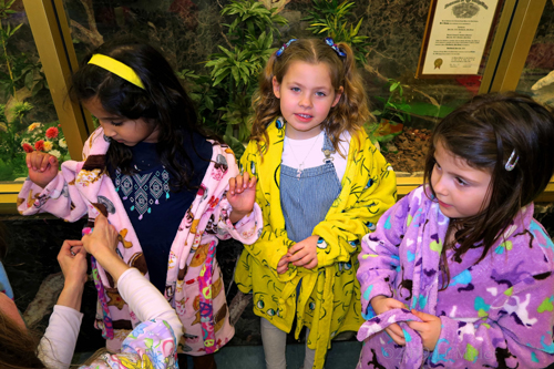 Party Guests Getting Comfy In Their Spa Robes