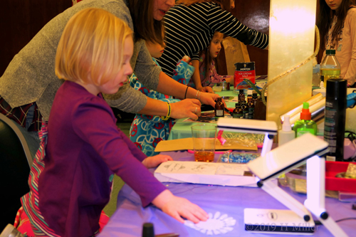 Wide Shot Of Spa Party Kids Craft And Nail Spa Station With Guests!