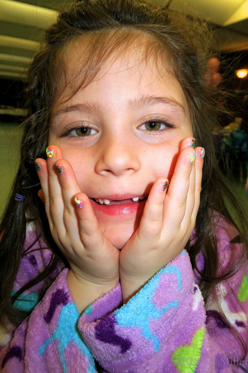 Birthday Girl Showing Off Her Decorative Mini Mani Birthday Girl Showing Off Her Decorative Mini Mani