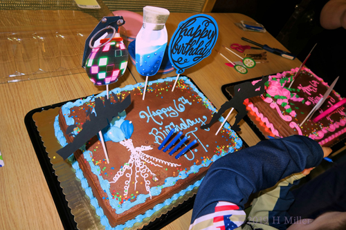 Chocolate Frosted Birthday Cakes With Fun Decorative Pieces Chocolate Frosted Birthday Cakes With Fun Decorative Pieces