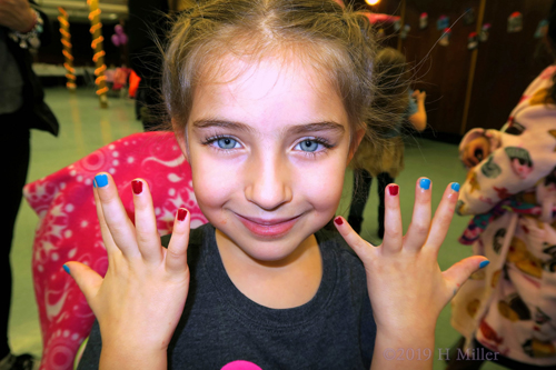 She's Pleased With Her Mini Mani!