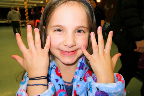 Showing Off Her Manicure For Children