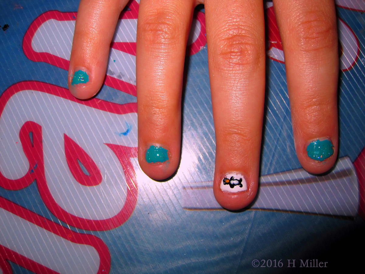 Have A Look At This Pretty Penguin Nail Art On Her Mini Mani. 