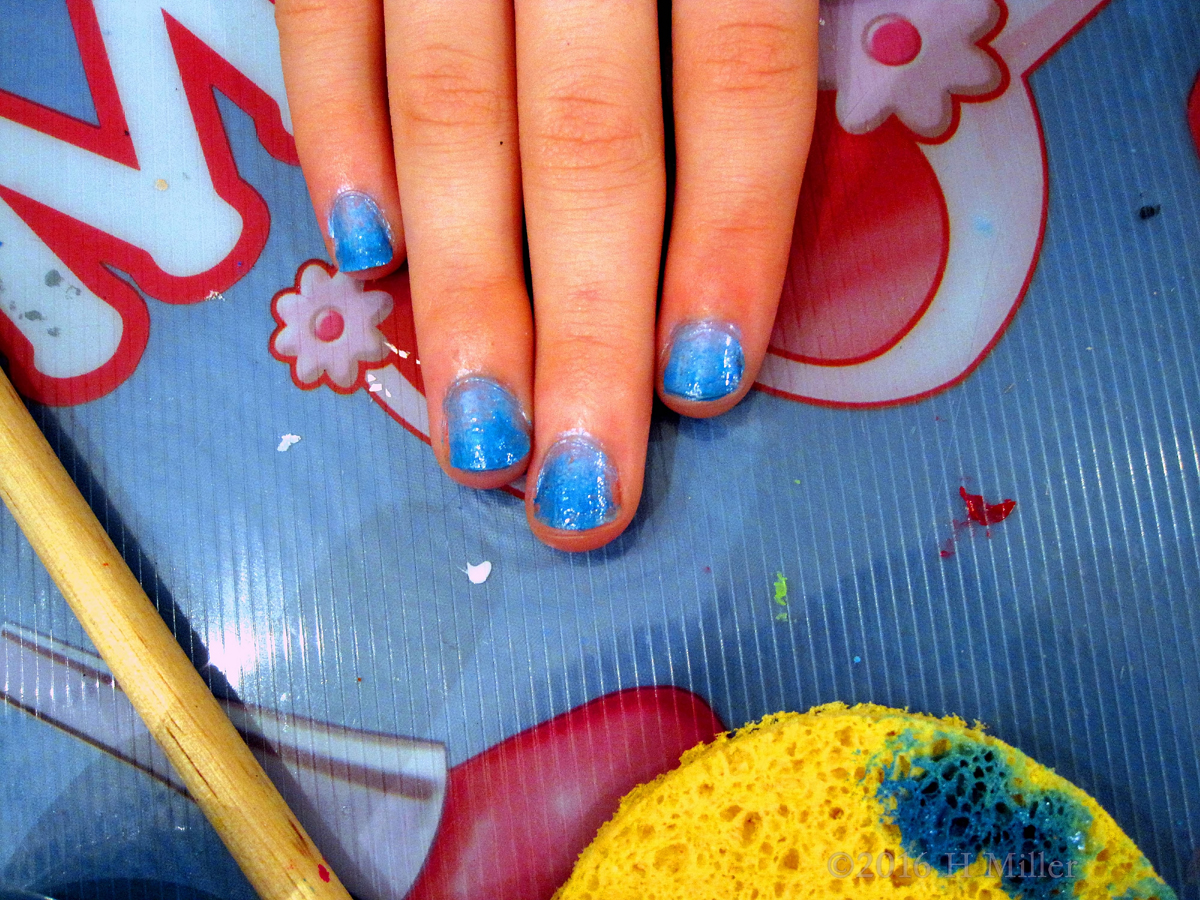 Shiny Sky Blue Nail Color Looks Great On This Girls Mini Mani. 