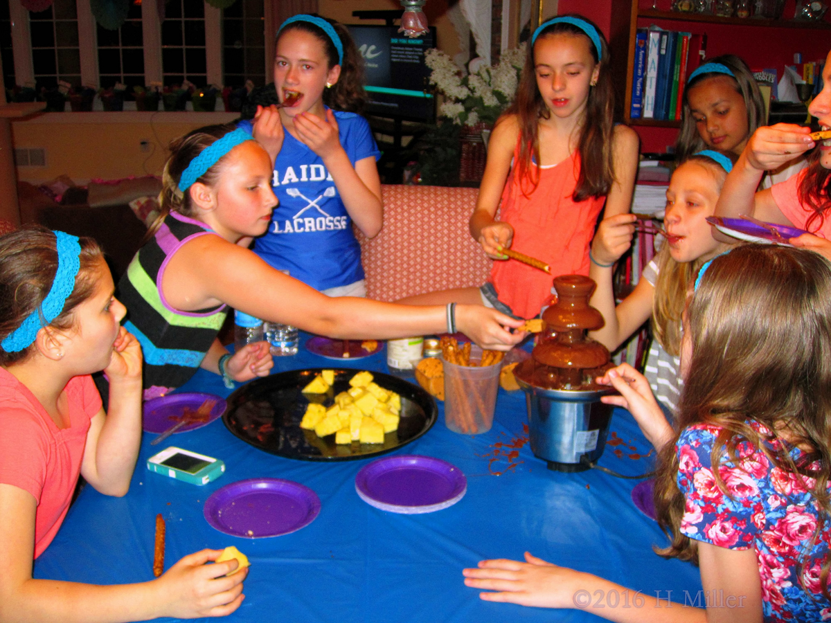 Snack Time Is Still Going On, And The Kids Are Making The Most Of The Chocolate Fondue Dipped Fruit And Cookies! 