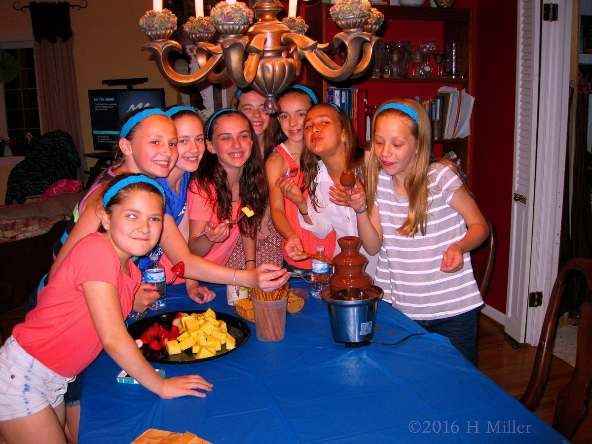 The Girls Are All Ready With Their Pines And Berries To Dip In The Chocolate Fountain!