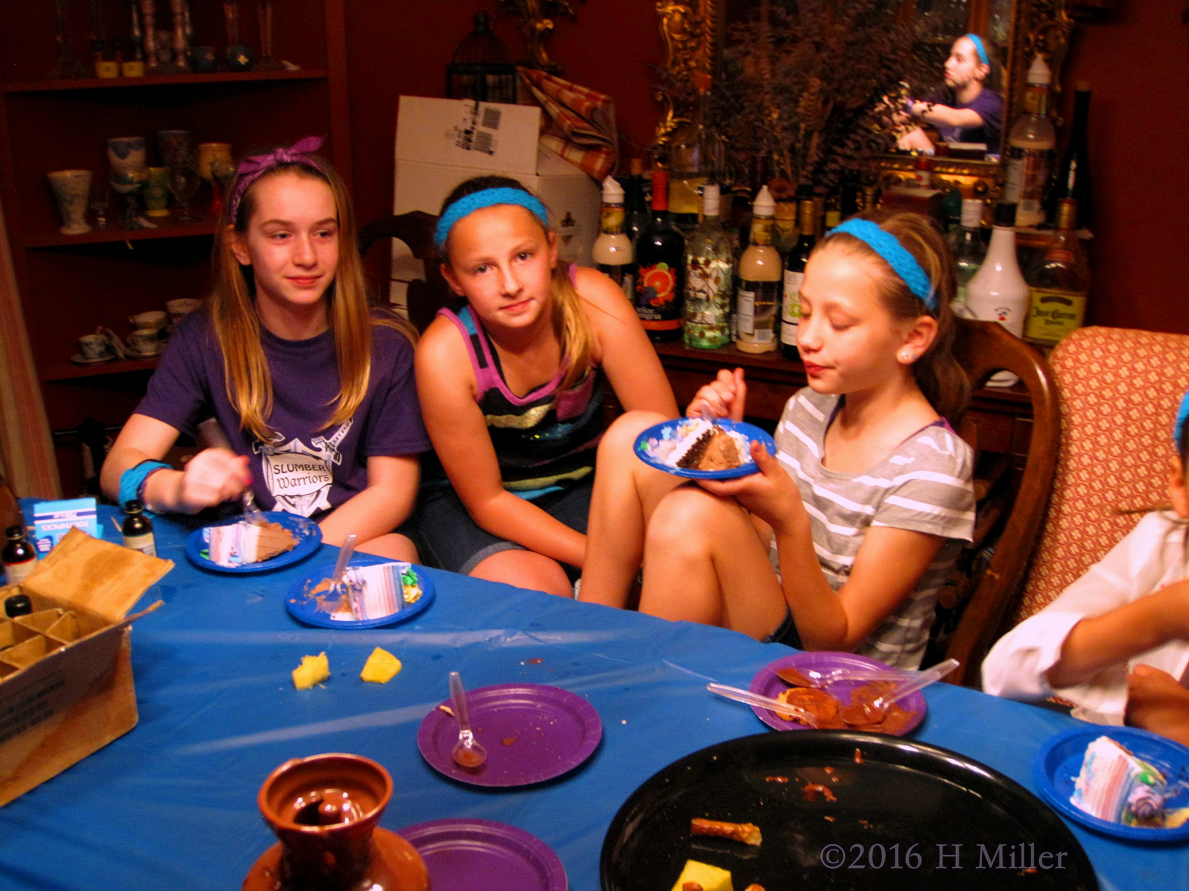 The Girls While Having Yummylicious Slices Of Cake. The Girls While Having Yummylicious Slices Of Cake.