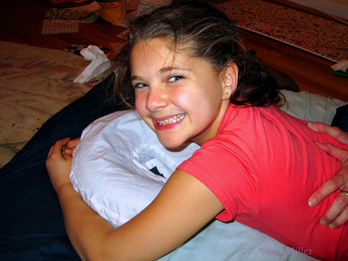 Birthday Girl Enjoying Her Kids Massage Activity. Birthday Girl Enjoying Her Kids Massage Activity.