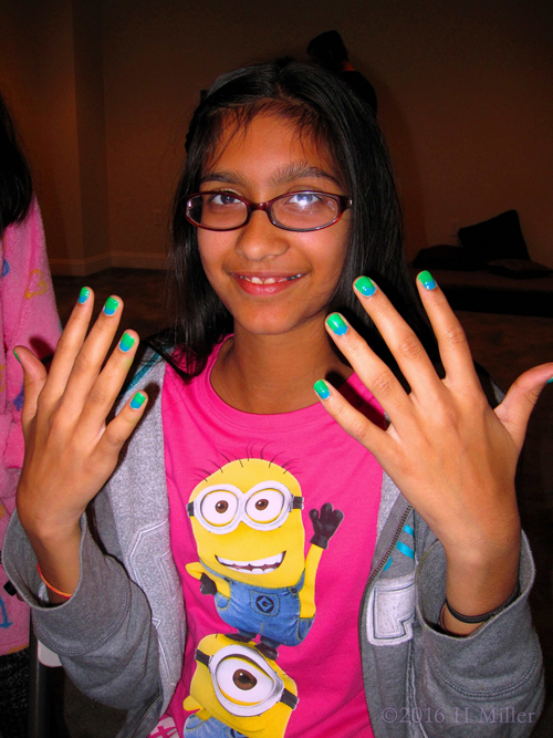 She Loves Her Blue And Green Manicure
