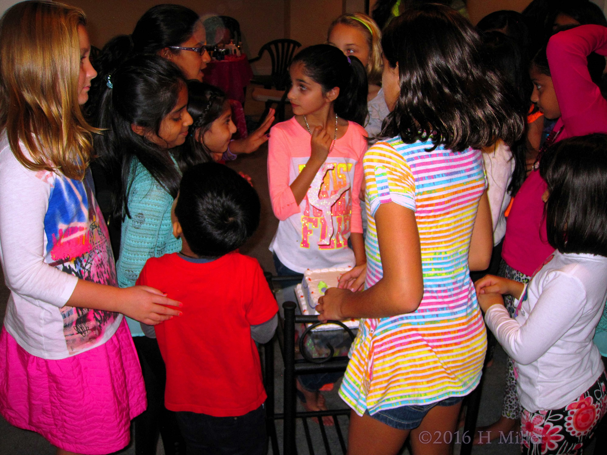 Crowding Around For Cake 