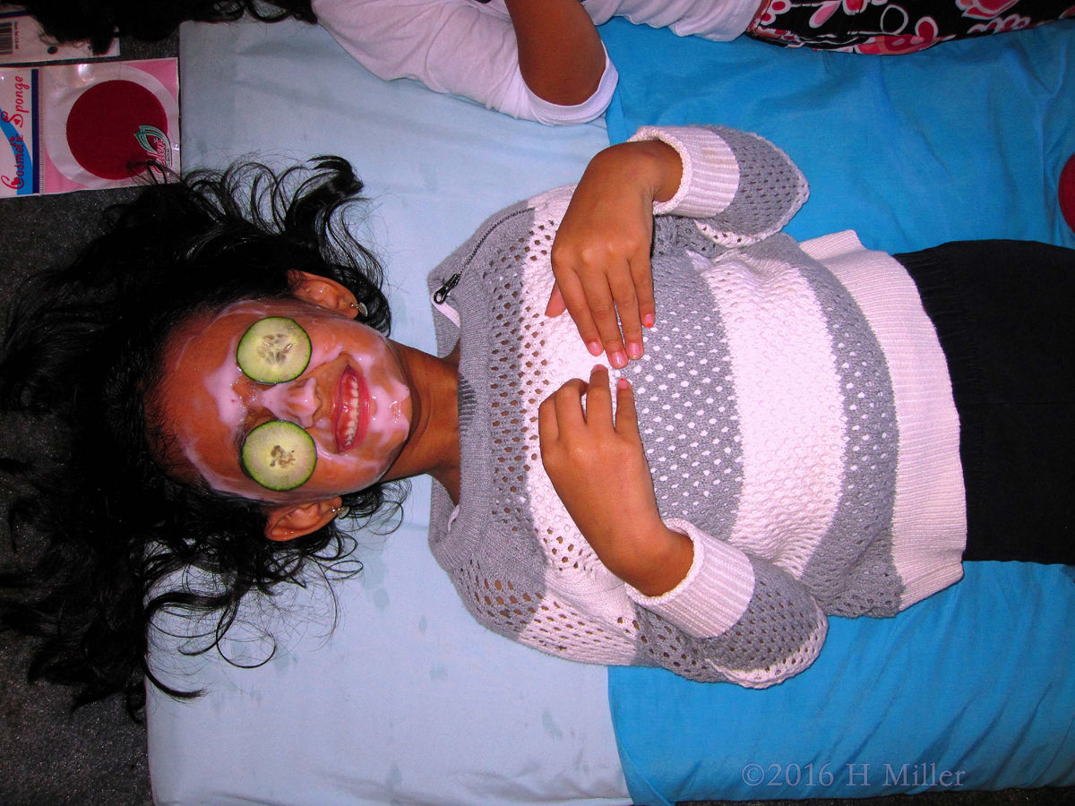 Smiling During Her Strawberry Face Mask 