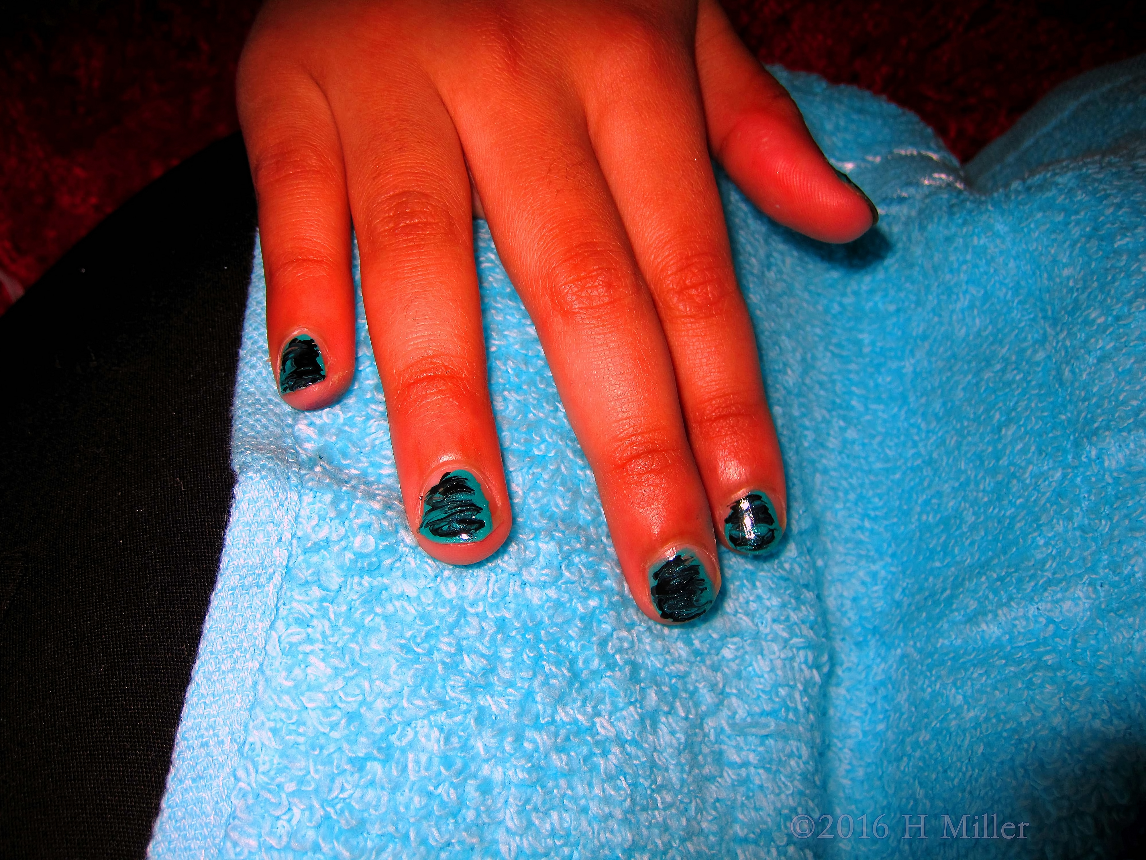 Black Squiggly Lines On Bluish Green. Kids Mani. Black Squiggly Lines On Bluish Green. Kids Mani.