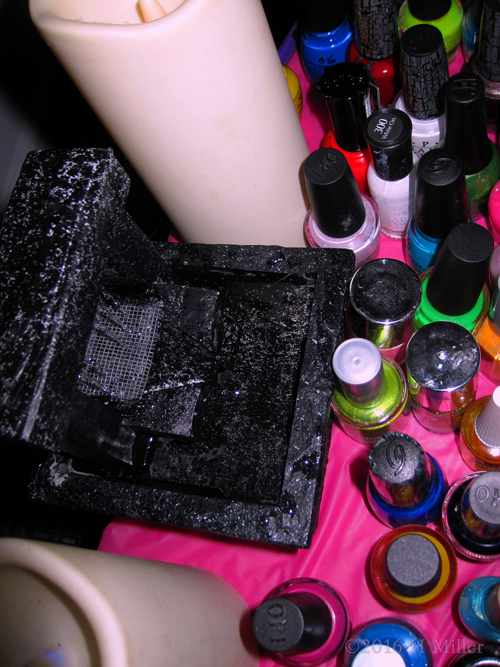 Close Up Of Fountain And Nail Polish. Close Up Of Fountain And Nail Polish.