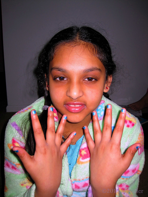 Showing Her Cool New Electric Blue Kids Mani. Showing Her Cool New Electric Blue Kids Mani.