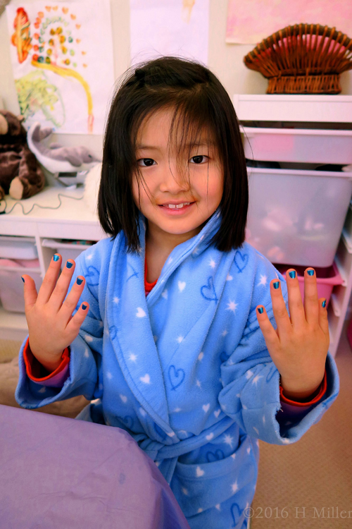 Her Blue Kids Mani Matches Her Kids Robe