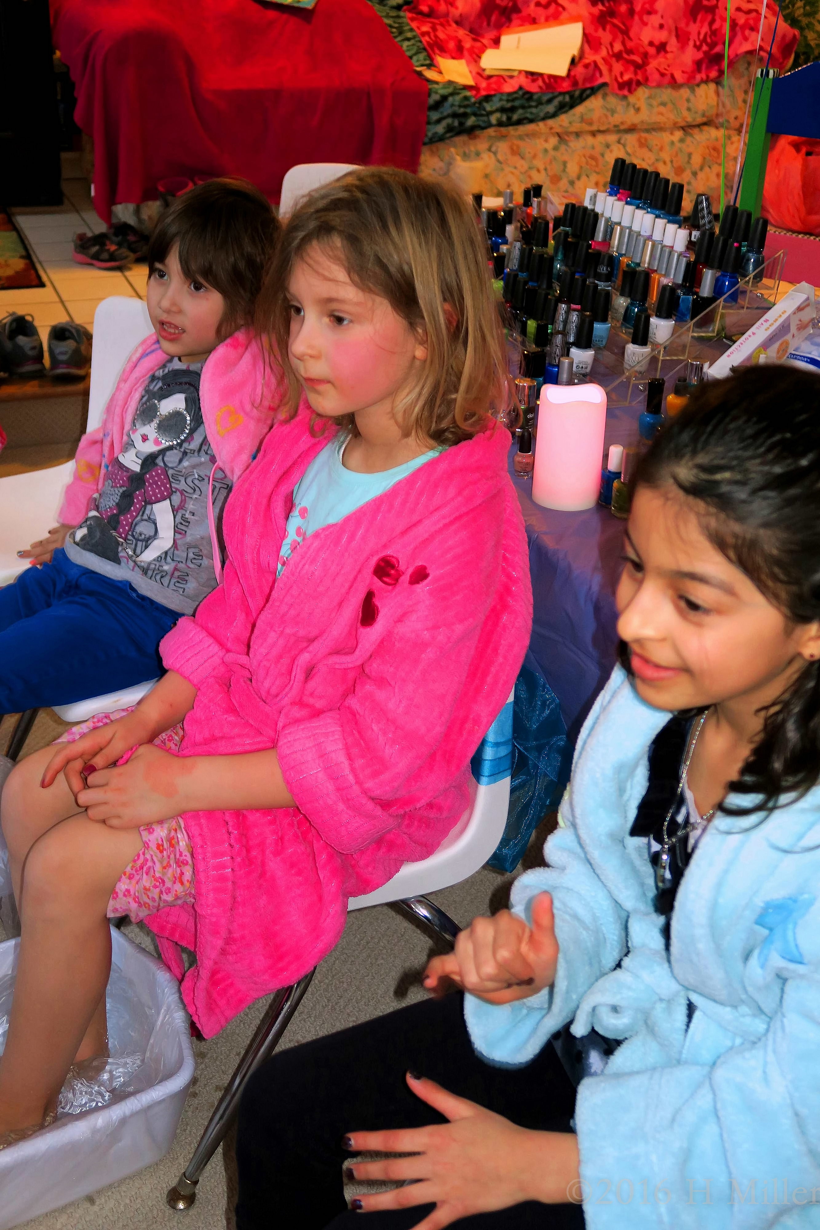 Attentively Watching During The Kids Pedicure Foot Soak 