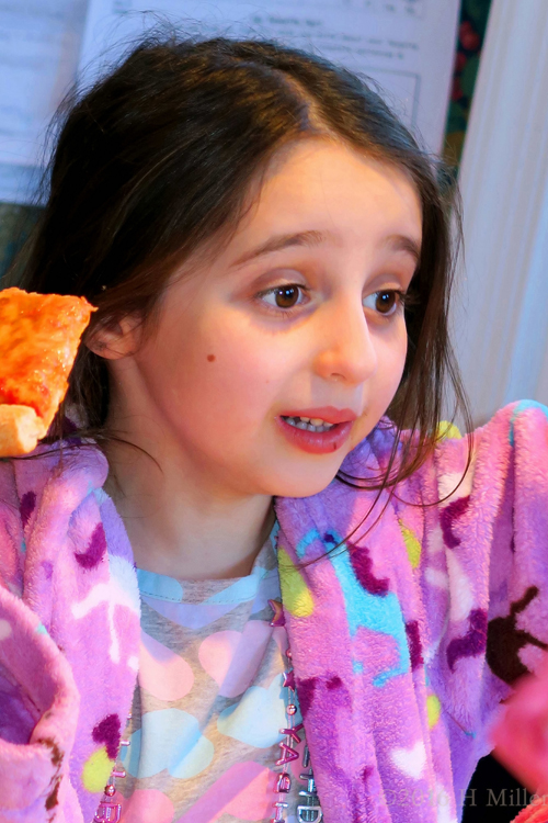 The Birthday Girl Enjoys Her Pizza!