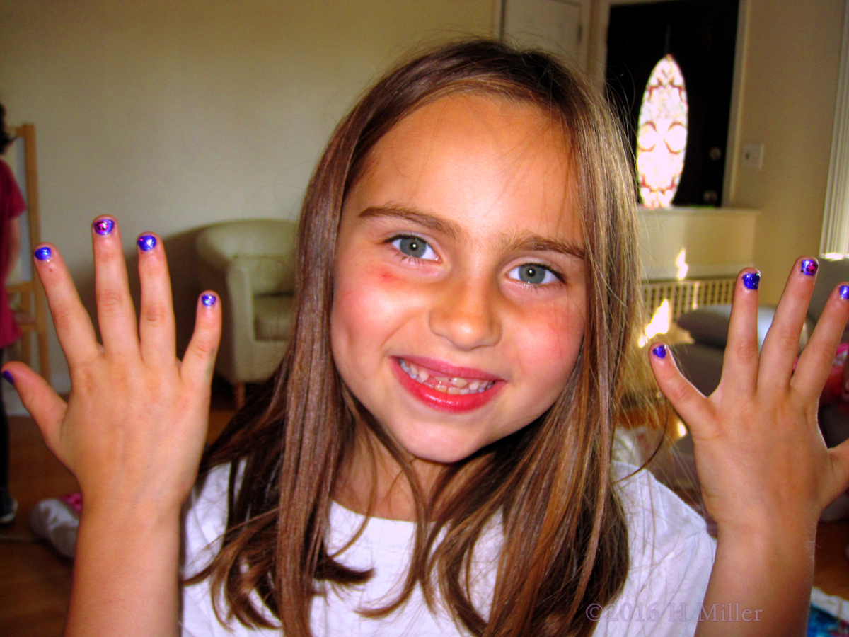 Smiling Wide About Her Mini Mani! 
