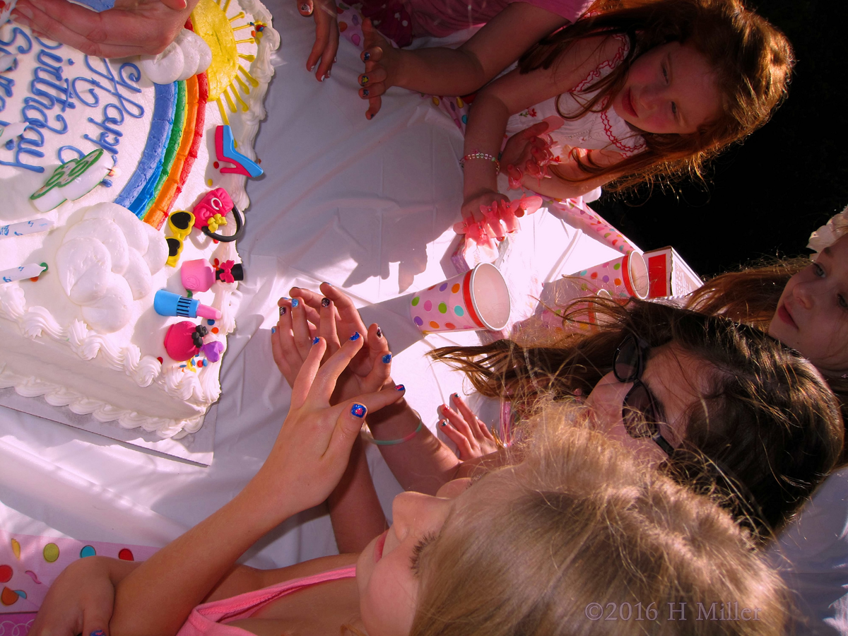 Looking At The Birthday Cake 