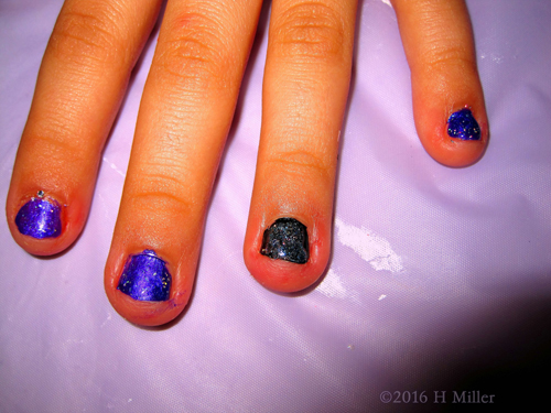 Glittery Purple And Green Mini Manicure Glittery Purple And Green Mini Manicure