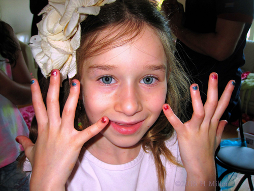 She's Loving Her Pretty Mini Manicure