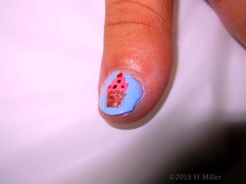 But Here Is The Cupcake On Her Other Hand