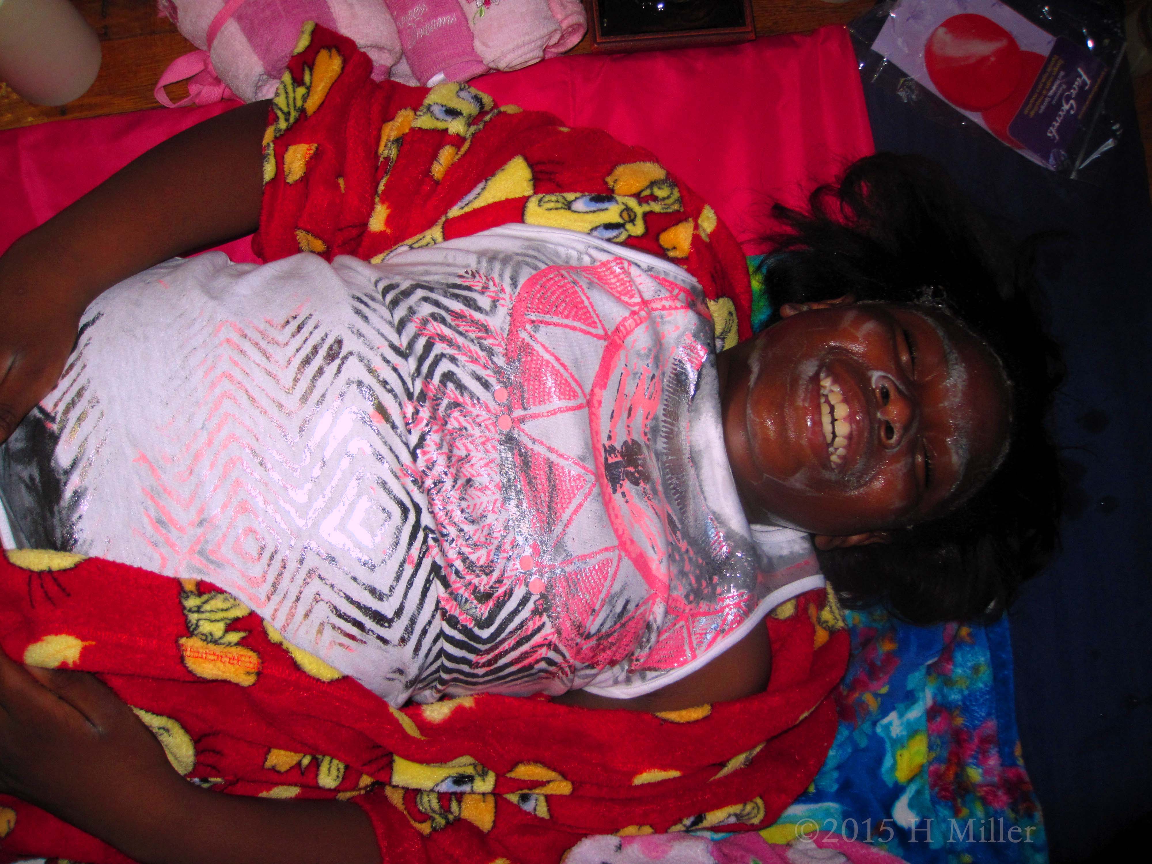 Laughing With Her Face Masque On