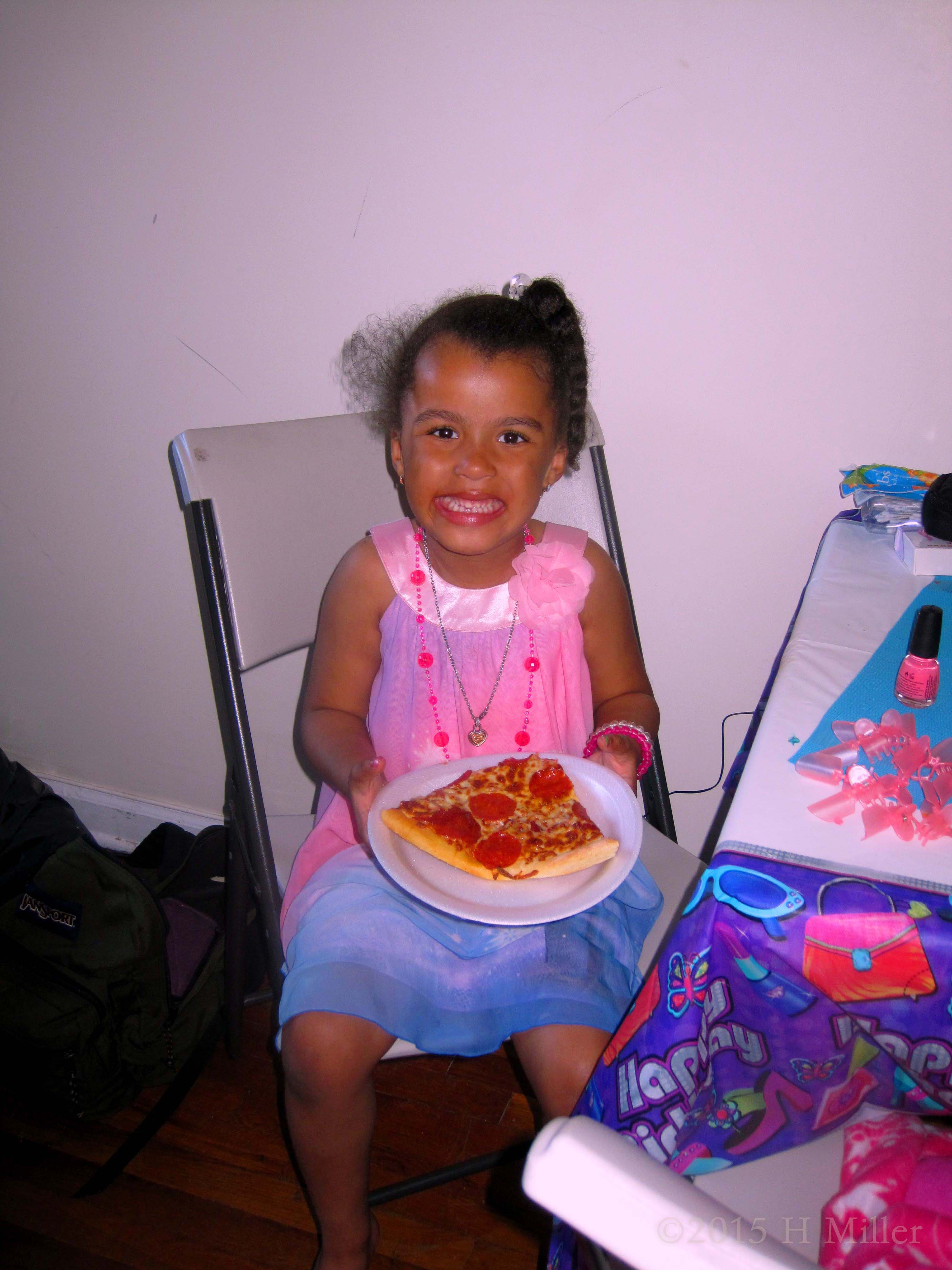 She Has A Big Smile Eating Her Pizza At Sariah's Birthday Party She Has A Big Smile Eating Her Pizza At Sariah's Birthday Party