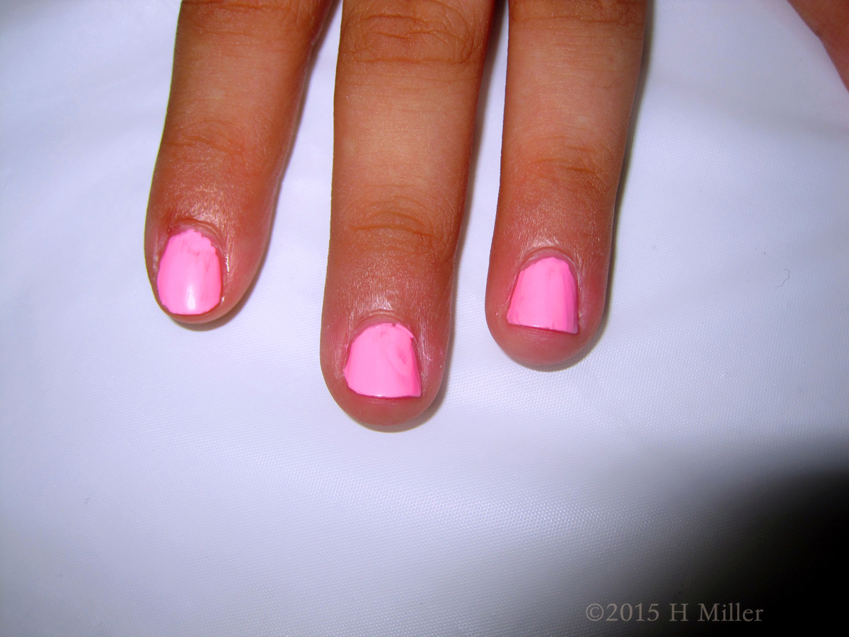 Again Her Pink Nails Seem Plain 